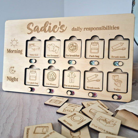 Daily responsibility chart with task tokens